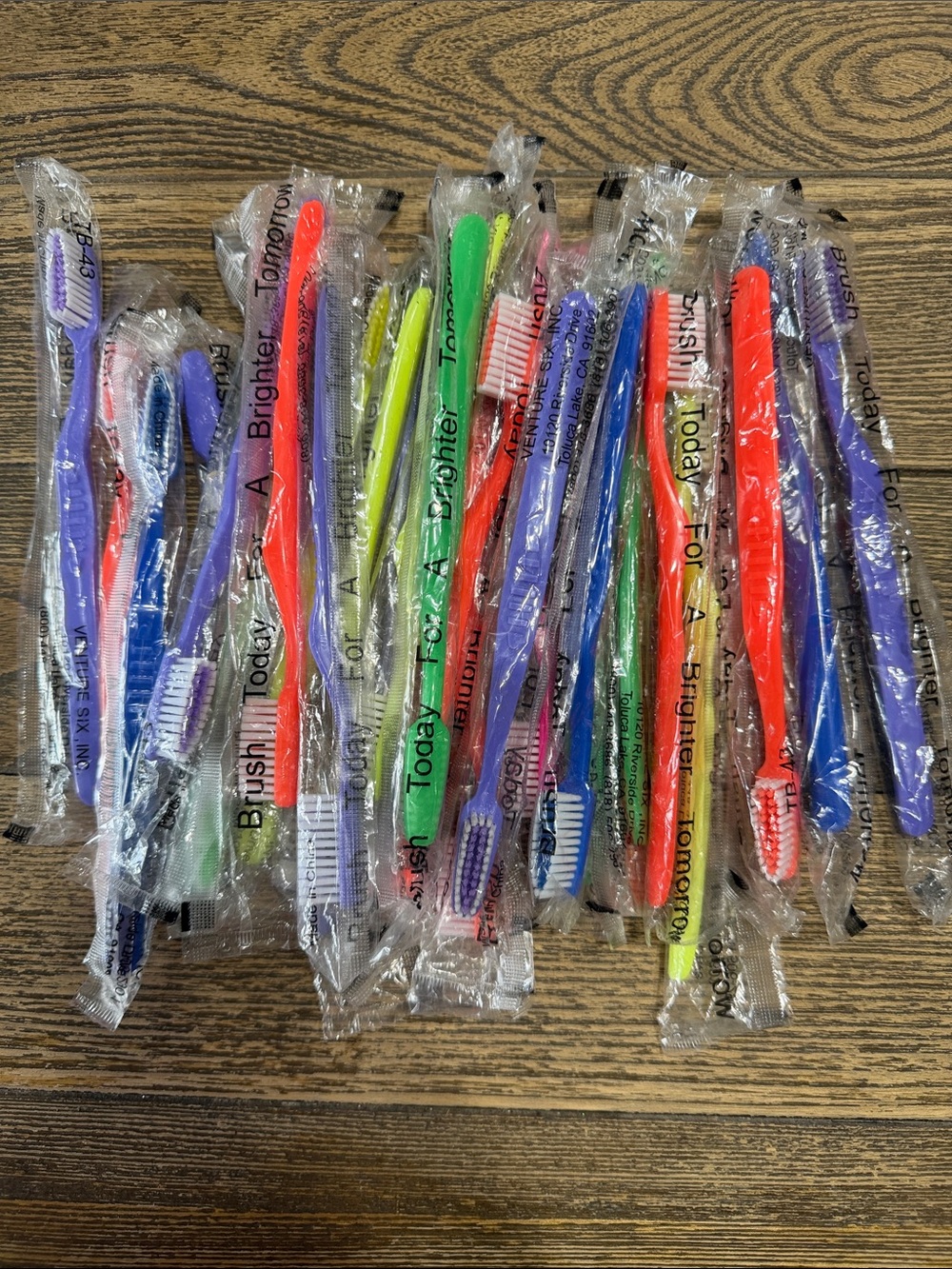 25 Disposable Assorted Color Toothbrushes - Multipack perfect for travel or gym